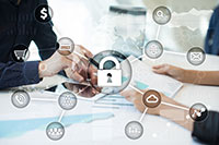 Two people looking at documents.