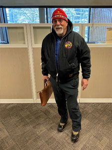 Man standing in an office.