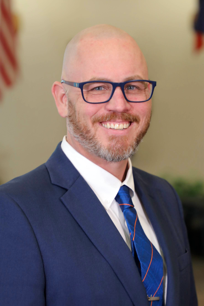 Professional Portrait of Peter Wells.